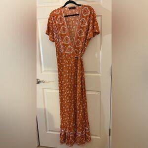 Beautiful maxi wrap around tie shortsleeved Dress. NWOT
